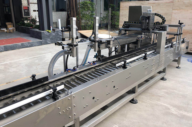 тос дүүргэх хувин таглах машин.jpg