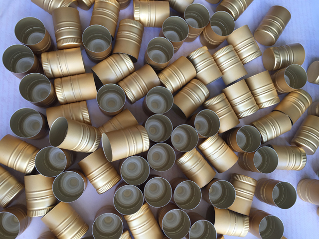 caps samples sent from usa customer for capping machine хөнгөн цагаан таг.jpg