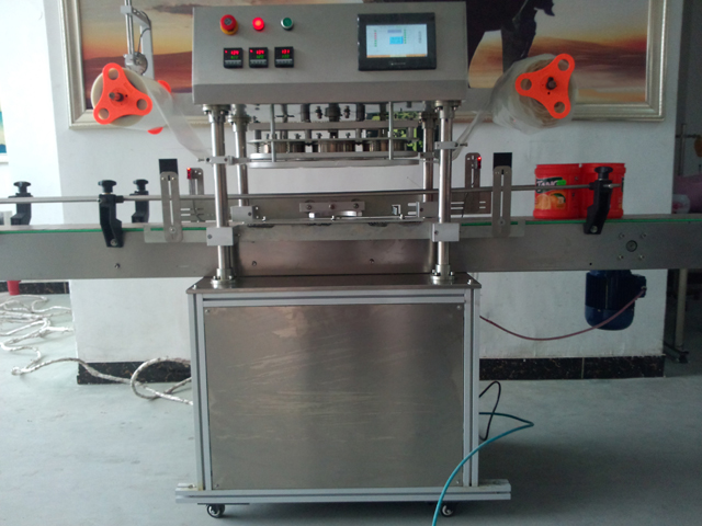 automatic three heads jars sealing equipment лонхтой битүүмжлэх машин.jpg