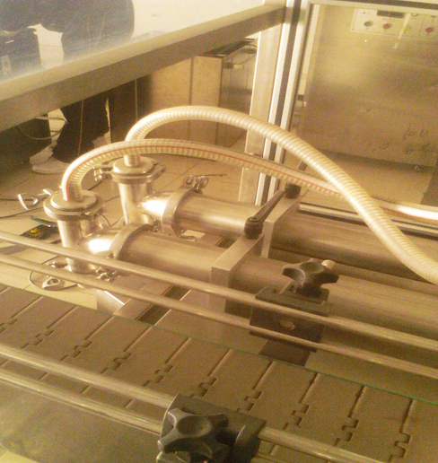 автоматаар тоноглогдсон давхар толгойтой дүүргэгч машин.jpg