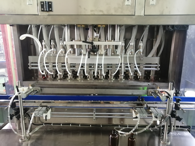 Холигч халаагууртай 12 толгой дүүргэгч машин (4).jpg